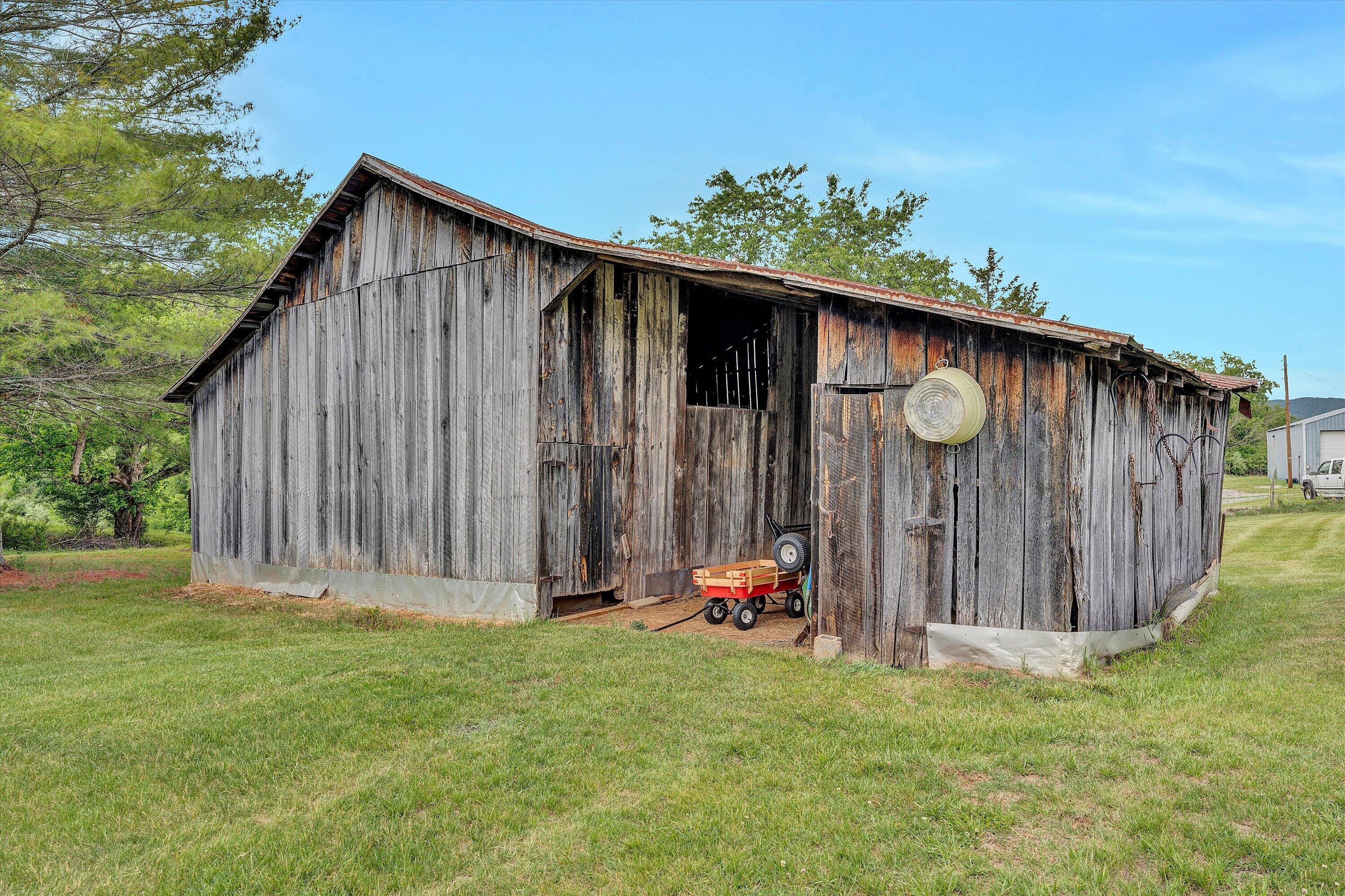 341 Springwood Road Fincastle, VA 24090 - Photo 51 of 55 a backyard of a house with lots of green space