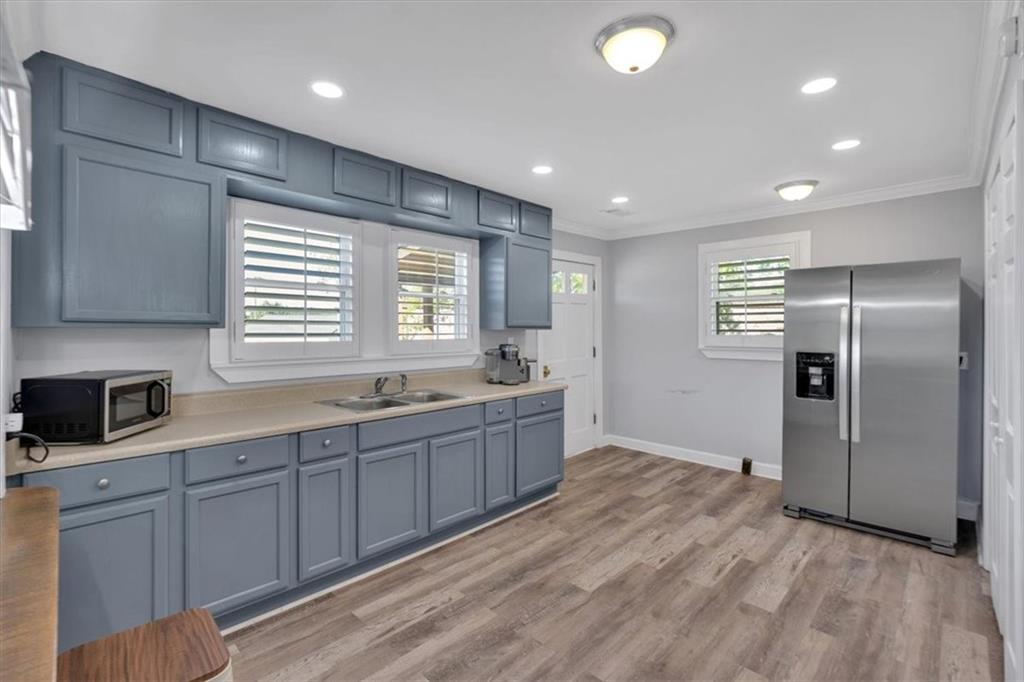 3049 Highway 411 White, GA 30184 - Photo 16 of 49 a large kitchen with stainless steel appliances granite countertop a refrigerator and a sink