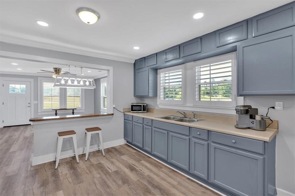 3049 Highway 411 White, GA 30184 - Photo 18 of 49 a large kitchen with granite countertop lots of counter space and sink