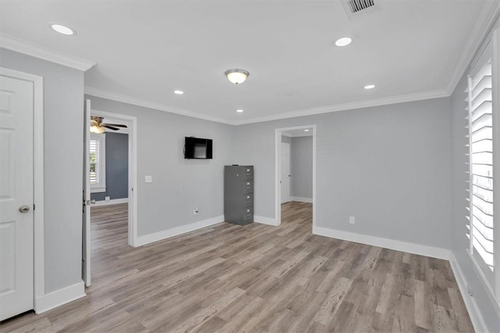 3049 Highway 411 White, GA 30184 - Photo 25 of 49 a view of empty room with wooden floor and window