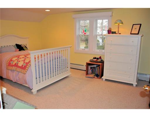 321 Rochambeau Avenue Providence, RI 02906 - Photo 9 of 12 Bedroom. 2nd floor bedroom with built in shelves, storage area and closets.