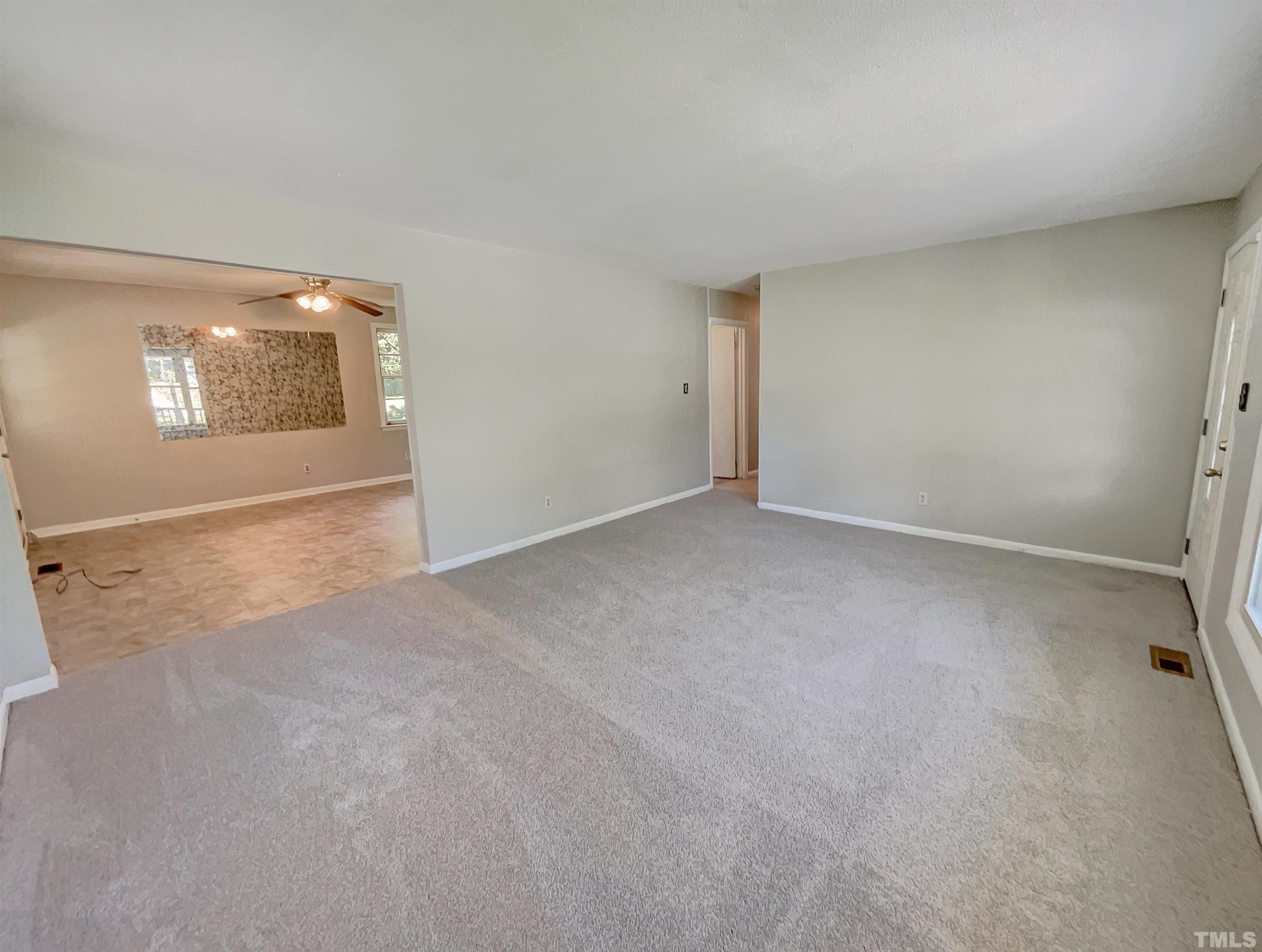 2011 Waters Drive Raleigh, NC 27610 - Photo 4 of 18 a view of an empty room with a window