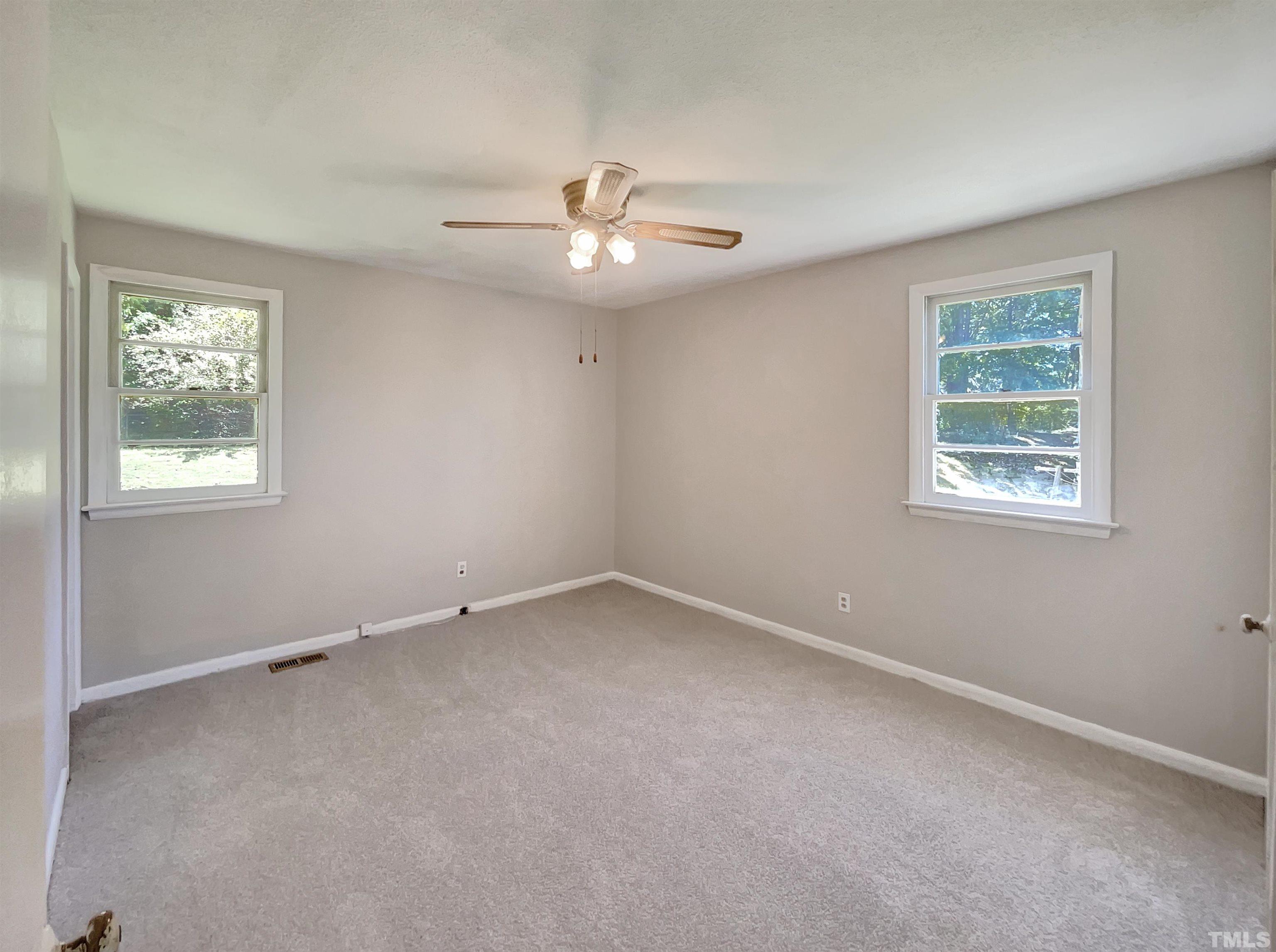 2011 Waters Drive Raleigh, NC 27610 - Photo 8 of 18 a view of an empty room with a window