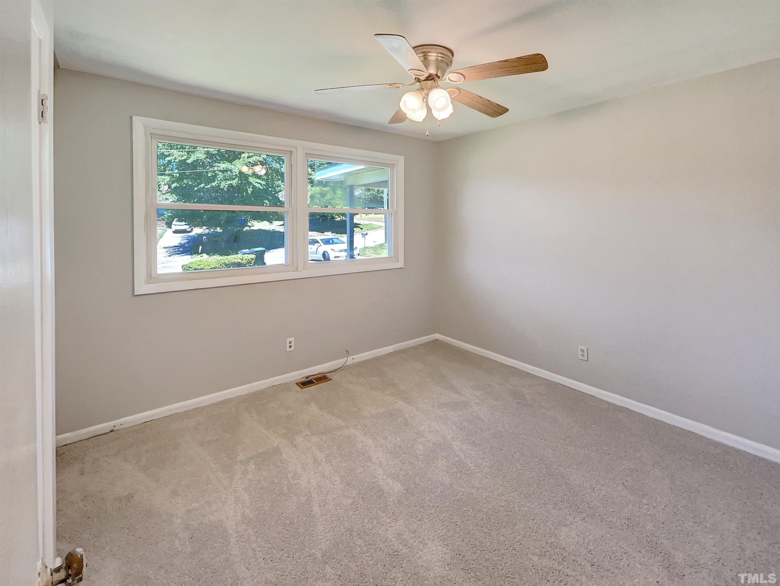 2011 Waters Drive Raleigh, NC 27610 - Photo 9 of 18 an empty room with a window
