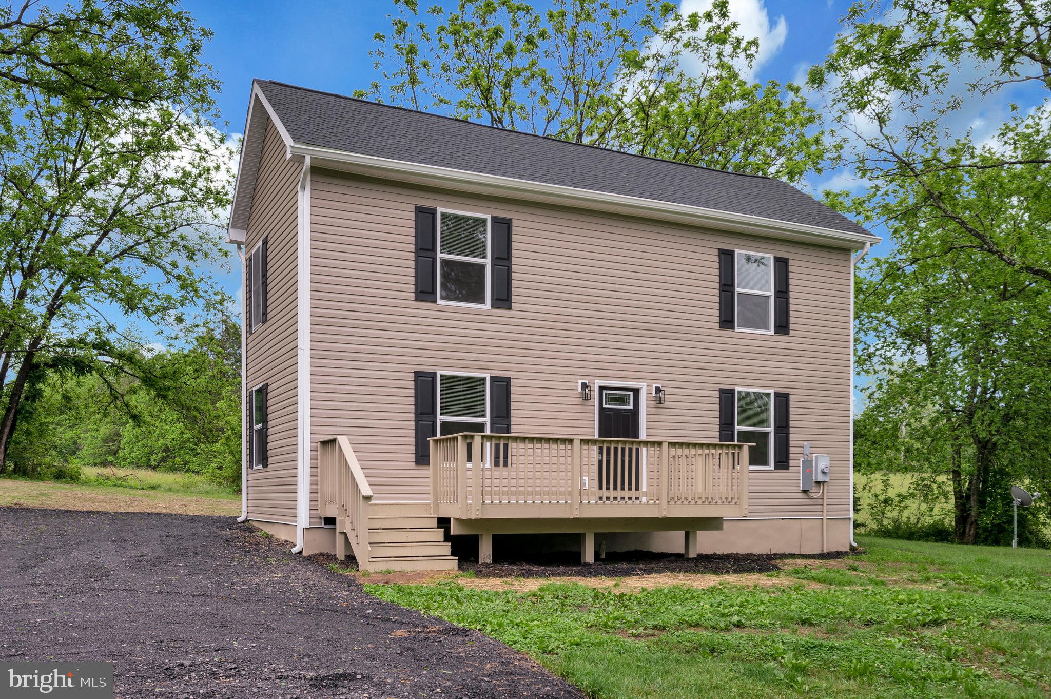 14169 Silver Hill Road Sumerduck, VA 22742 - Photo 34 of 40 a view of a house with a yard