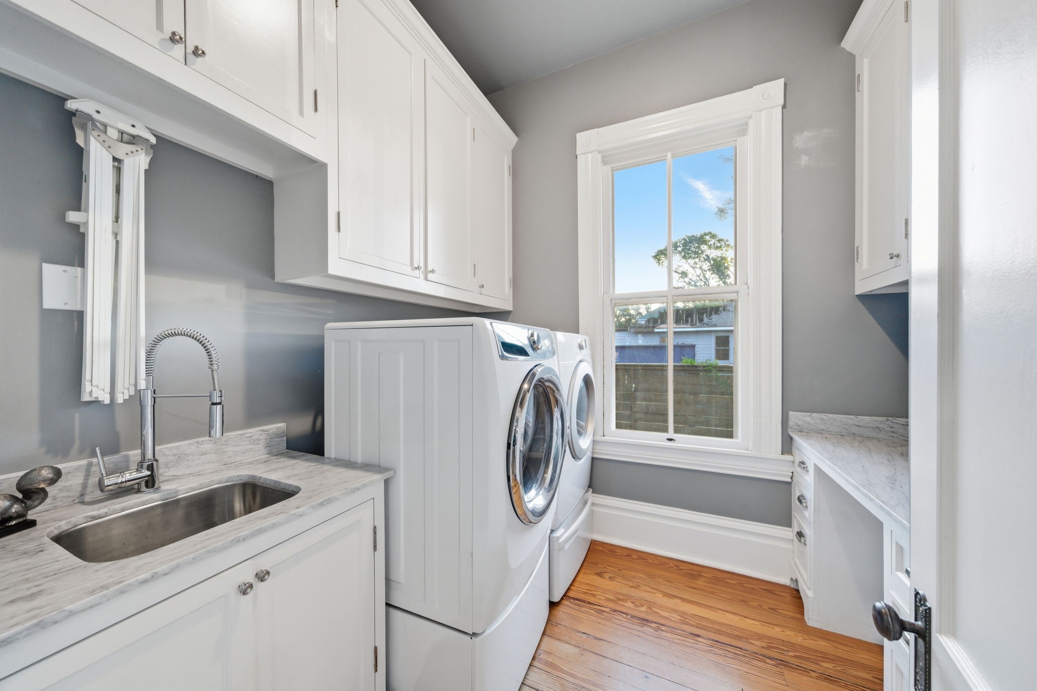 1818 Decatur Street Houston, TX 77007 - Photo 22 of 48 a utility room with sink dryer and washer