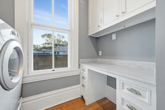 a view of washer and dryer sitting on a shelf