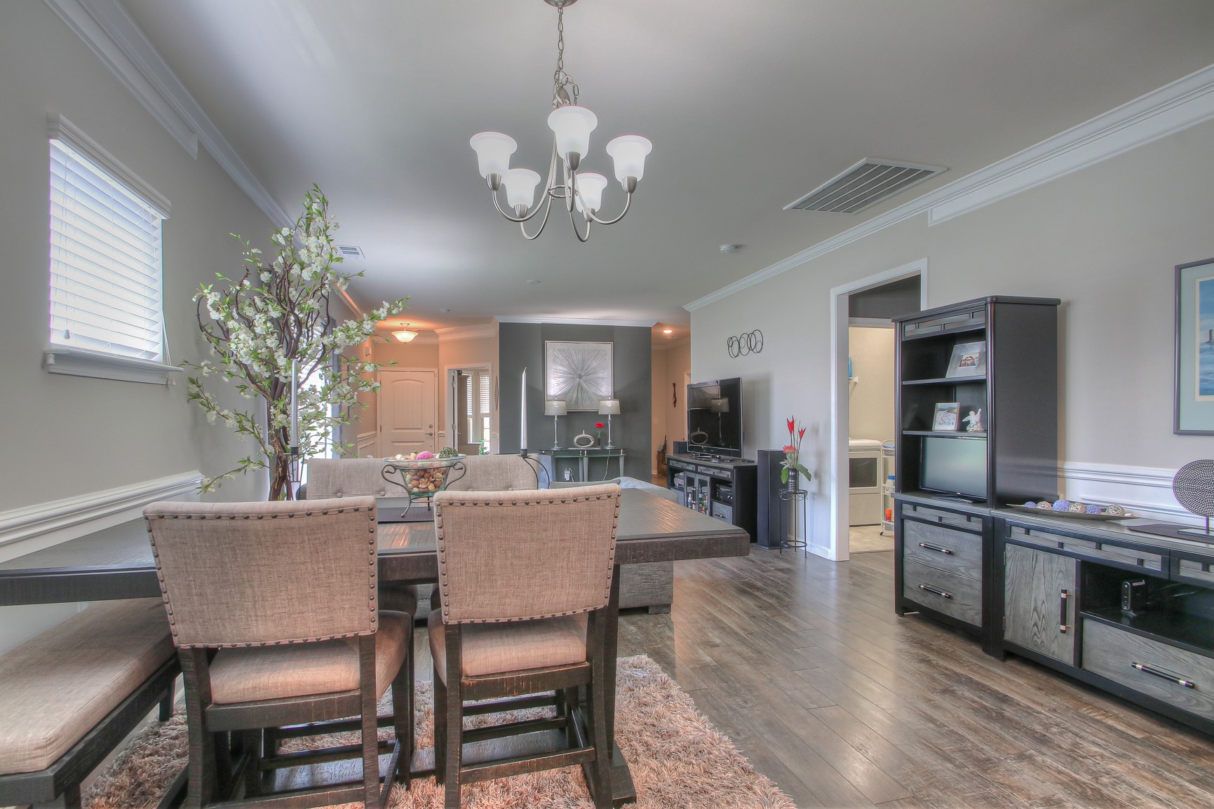 104 Tipton Pass Spring Hill, TN 37174 - Photo 11 of 40 a view of a dining room with furniture and wooden floor
