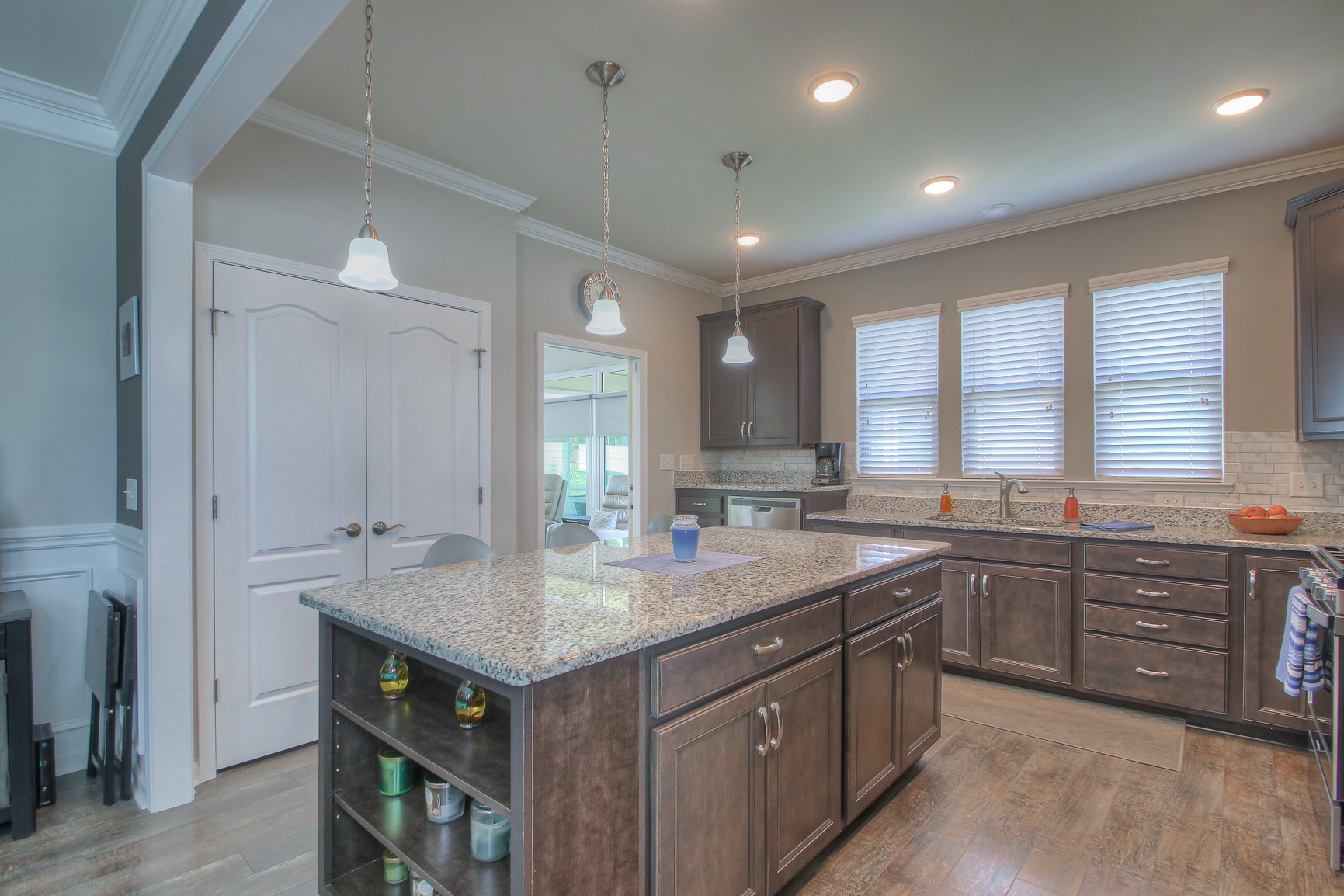 104 Tipton Pass Spring Hill, TN 37174 - Photo 15 of 40 a kitchen with a sink stove and cabinets