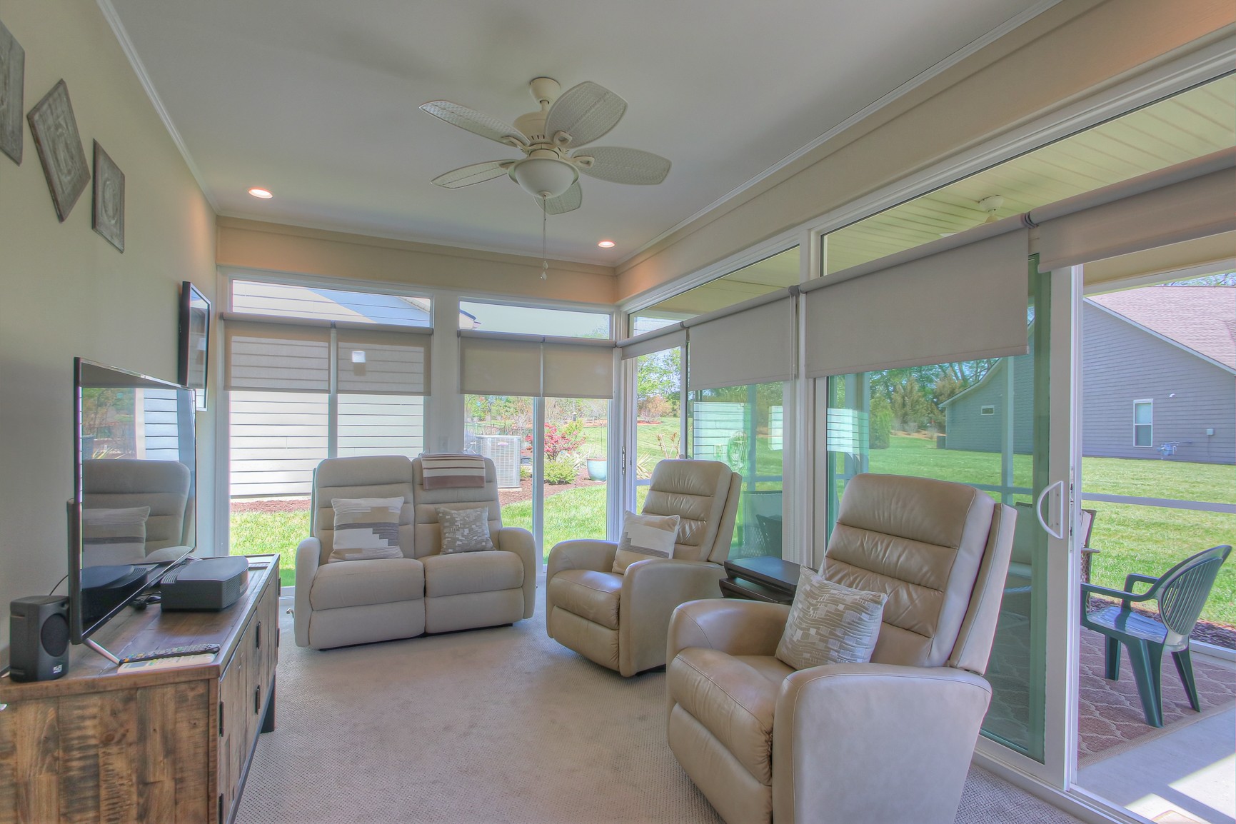 104 Tipton Pass Spring Hill, TN 37174 - Photo 17 of 40 a living room with furniture and a flat screen tv