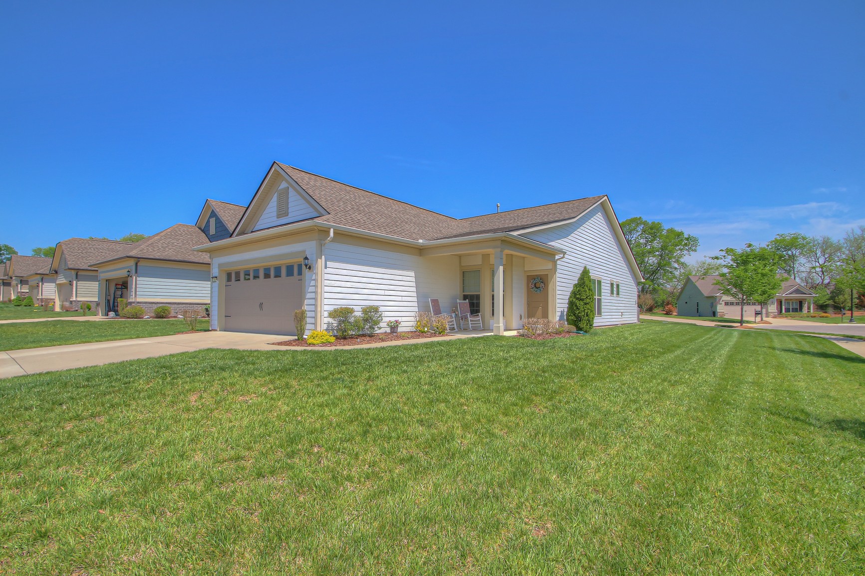 104 Tipton Pass Spring Hill, TN 37174 - Photo 2 of 40 a front view of a house with a yard