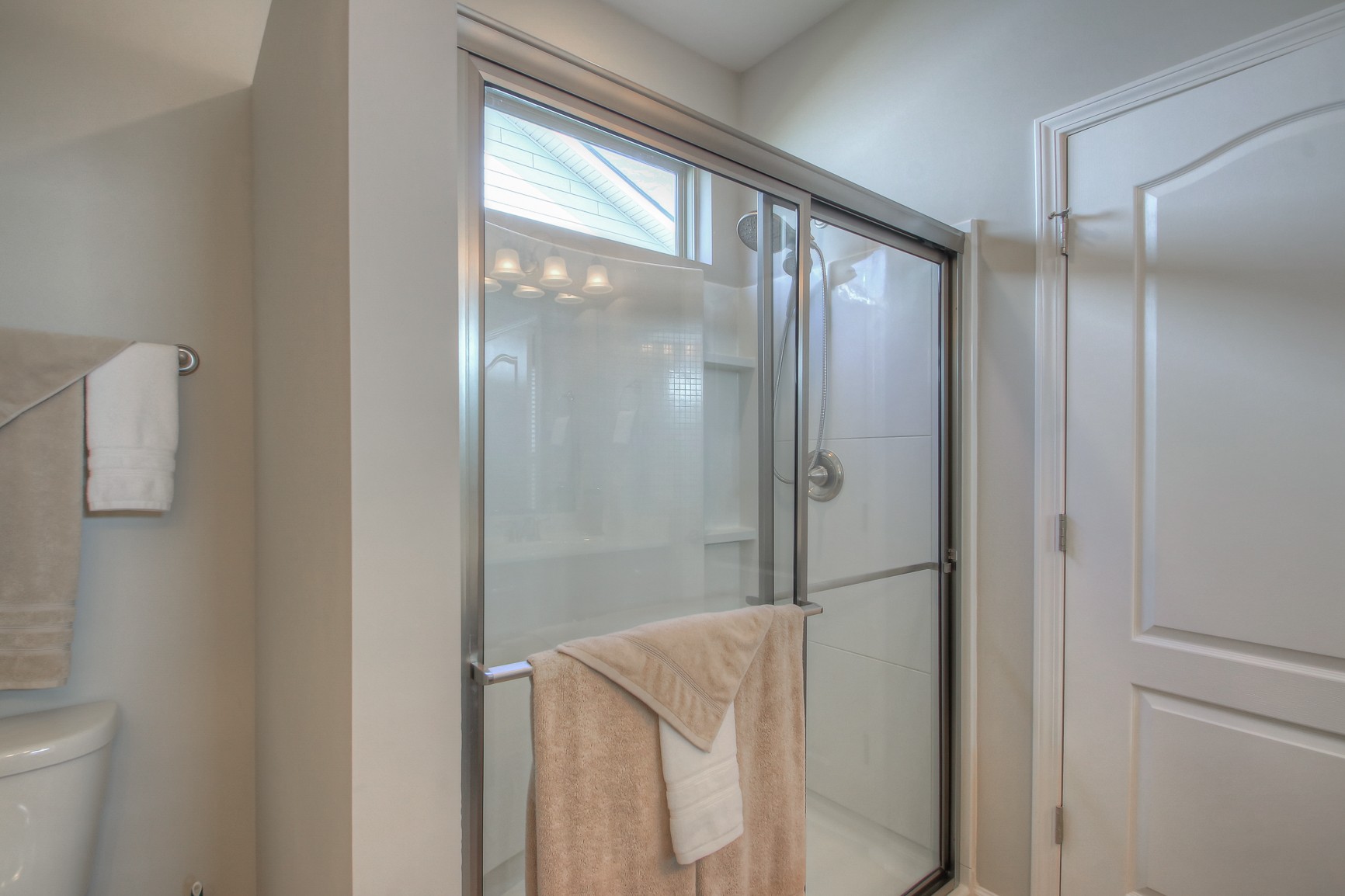 104 Tipton Pass Spring Hill, TN 37174 - Photo 22 of 40 a bathroom with a shower and a mirror