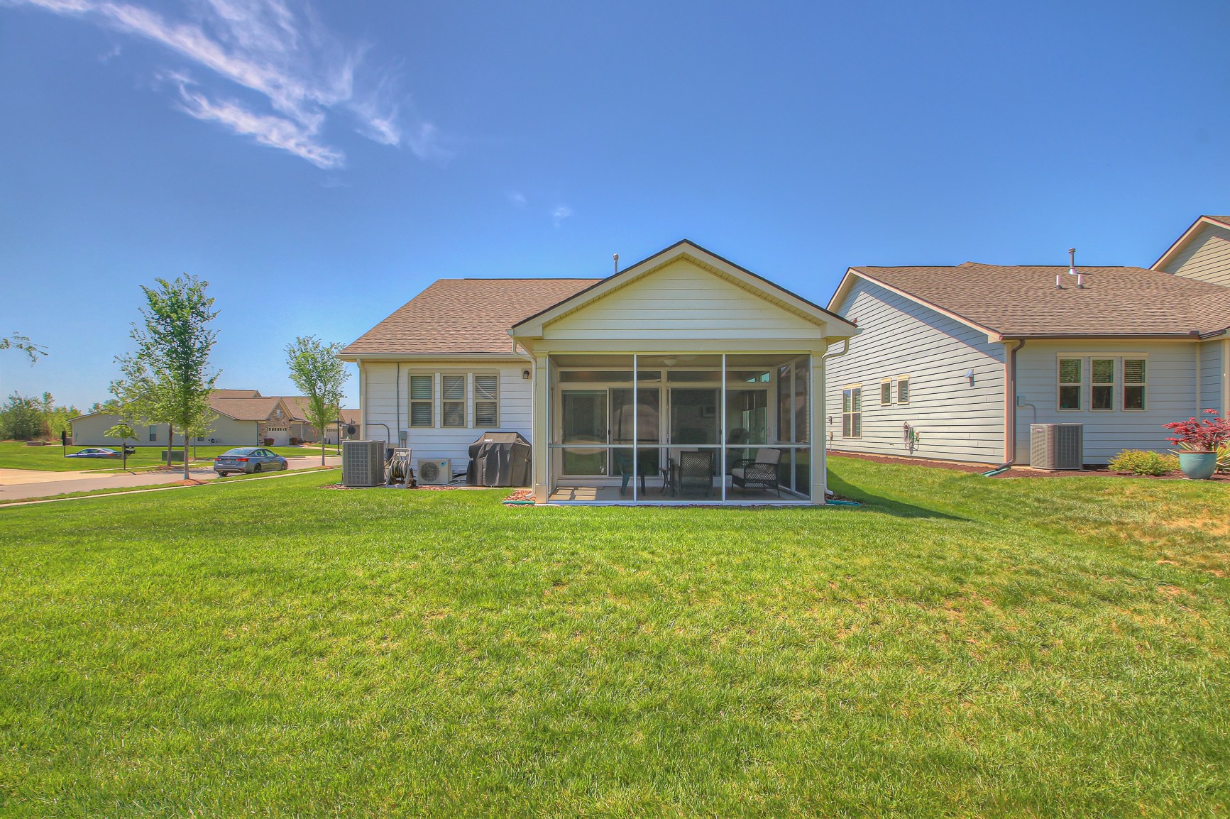 104 Tipton Pass Spring Hill, TN 37174 - Photo 29 of 40 a front view of a house with a garden