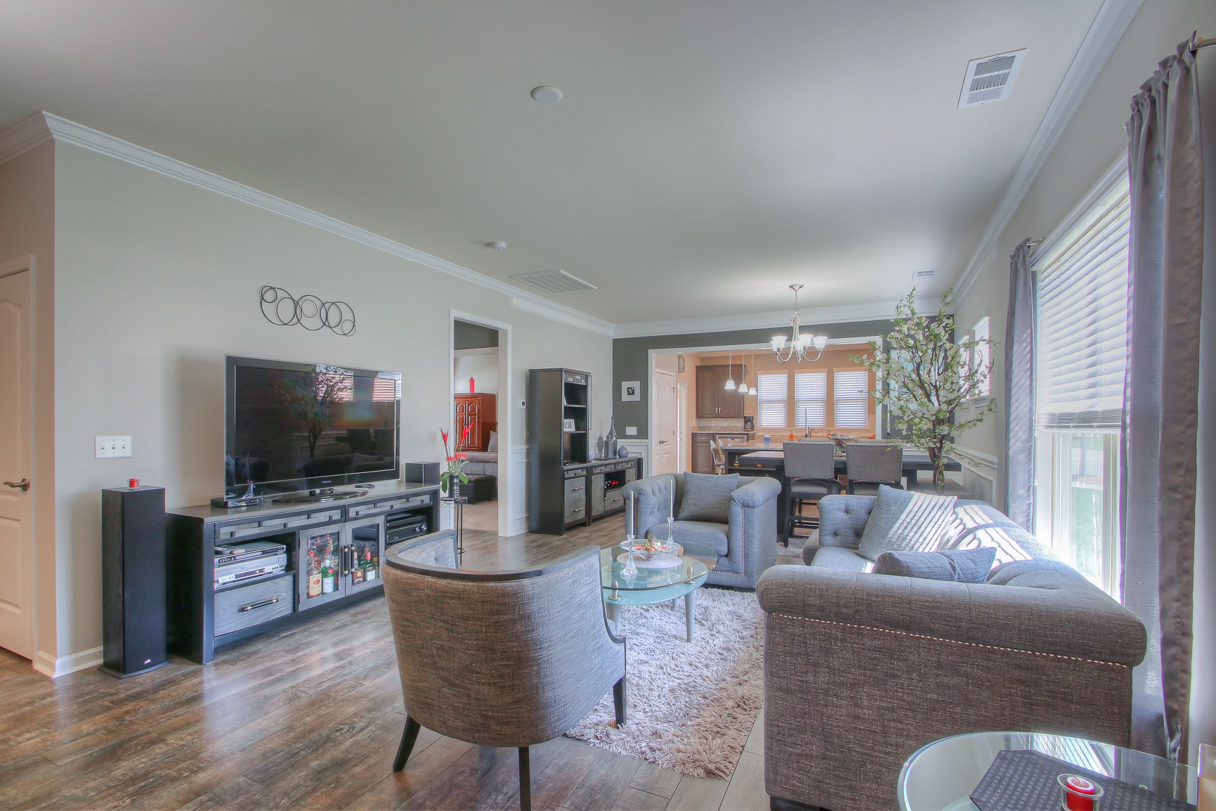 104 Tipton Pass Spring Hill, TN 37174 - Photo 5 of 40 a living room with furniture and a flat screen tv