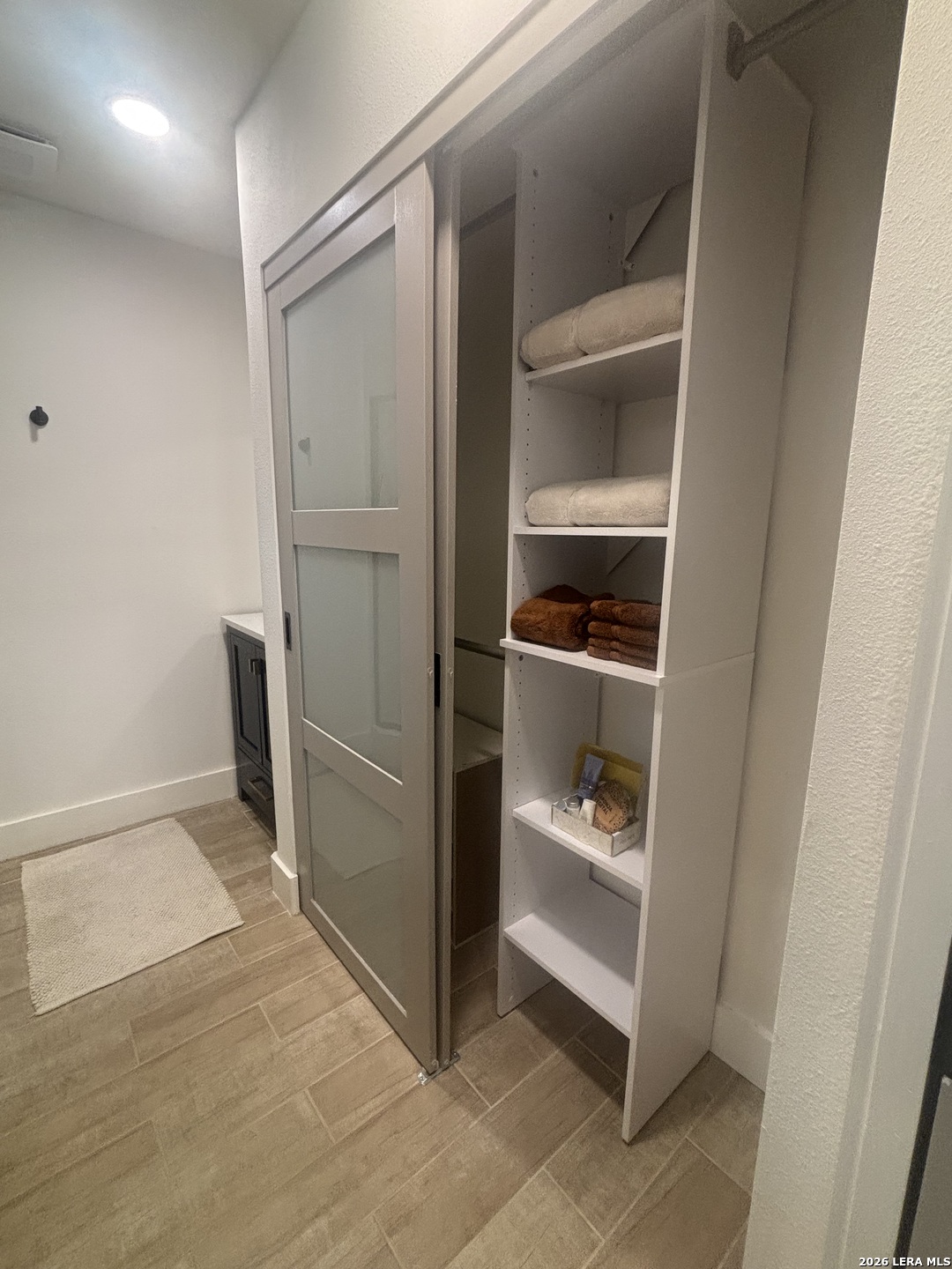 18014 Scenic Loop Road, Unit A Helotes, TX 78023 - Photo 13 of 22 a view of an empty walk in closet