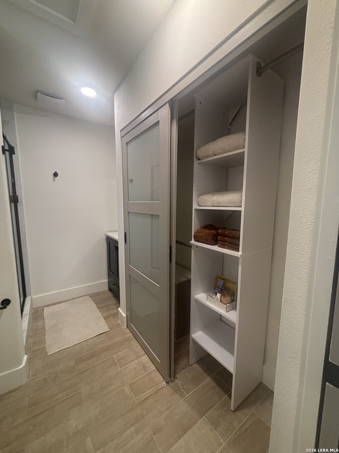18014 Scenic Loop Road, Unit A Helotes, TX 78023 - Photo 15 of 22 a view of an empty walk in closet