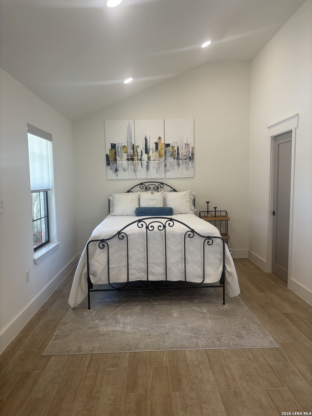 18014 Scenic Loop Road, Unit A Helotes, TX 78023 - Photo 3 of 22 a bedroom with a bed and a window
