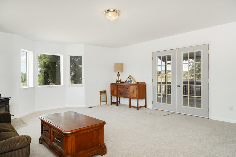 679 West Valley View Road Talent, OR 97540 - Photo 23 of 77 a living room with furniture and a window