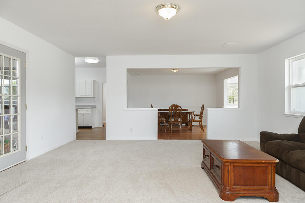679 West Valley View Road Talent, OR 97540 - Photo 24 of 77 a livingroom with furniture and a window