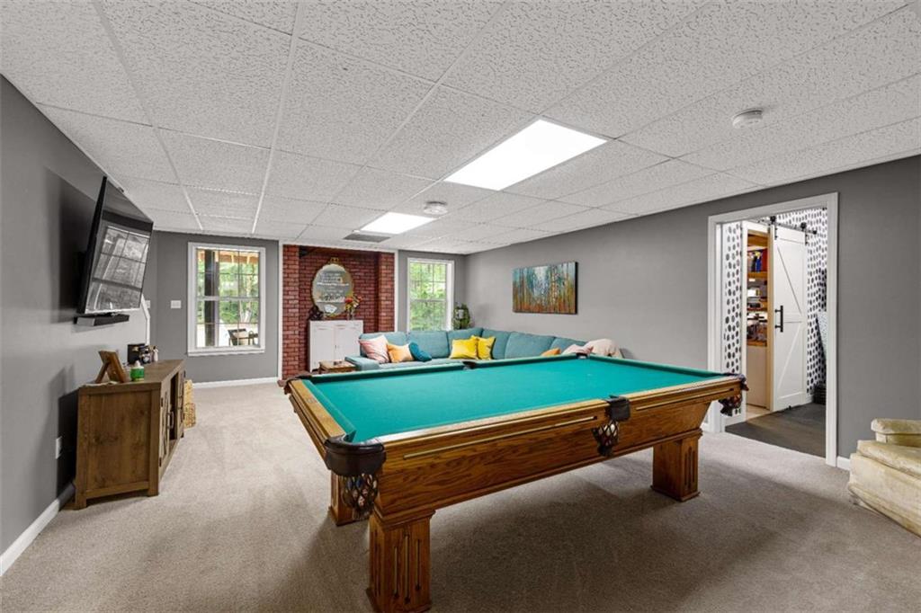 128 Byrom Road Senoia, GA 30276 - Photo 49 of 83 a room with pool table and windows