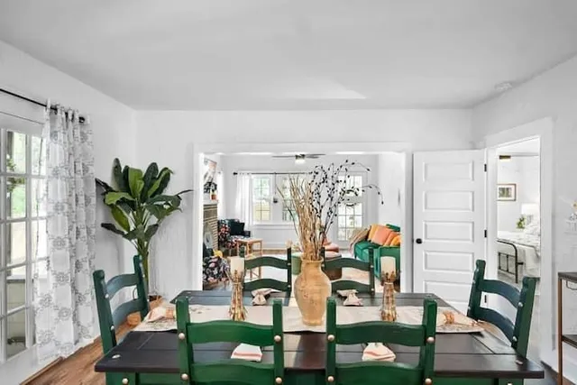a living room with furniture a rug and a fireplace