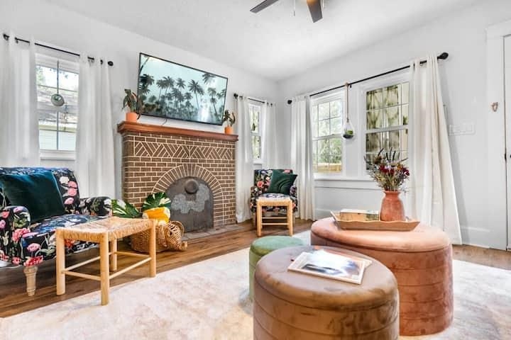111 Colon Avenue St. Augustine, FL 32084 - Photo 22 of 46 a living room with furniture a fireplace and a table