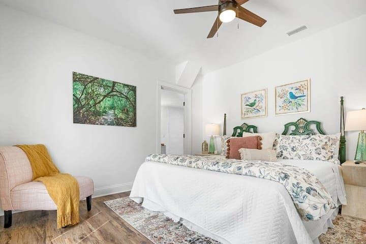 111 Colon Avenue St. Augustine, FL 32084 - Photo 32 of 46 a bedroom with a bed dresser and couch