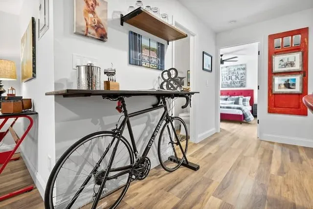 a view of an entryway with wooden floor