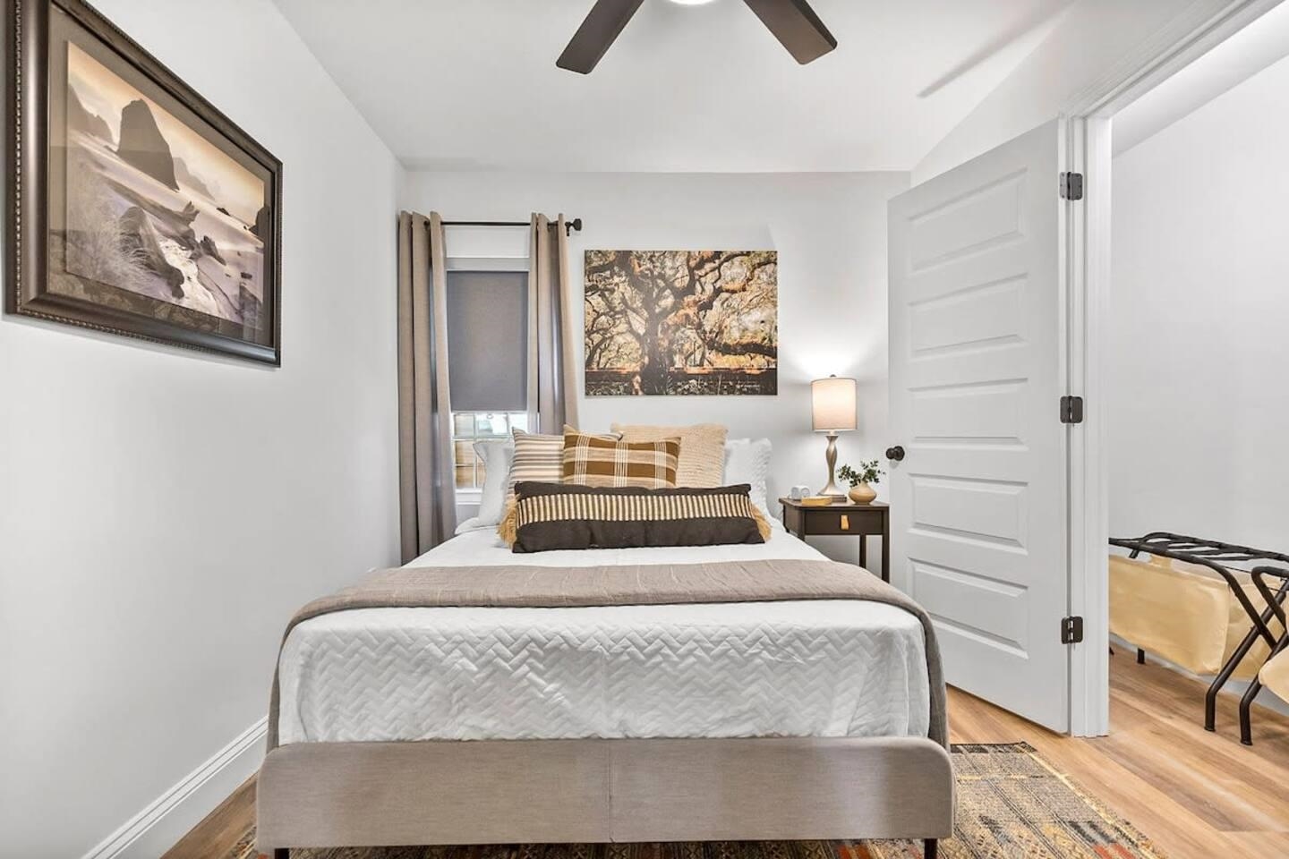 111 Colon Avenue St. Augustine, FL 32084 - Photo 44 of 46 a bedroom with a bed and wooden floor