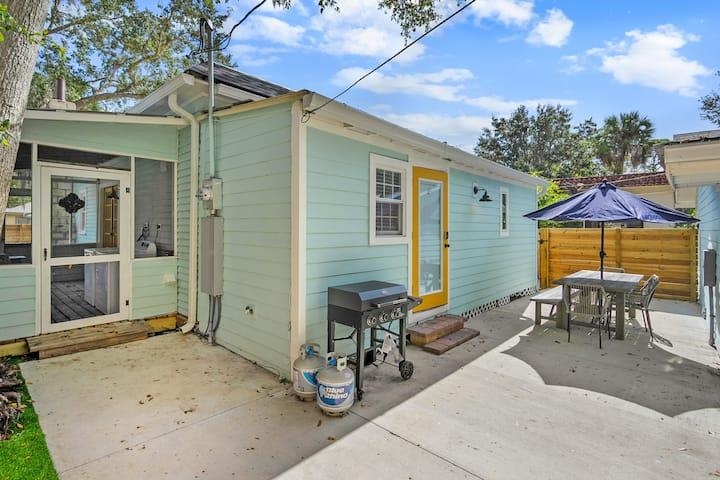 111 Colon Avenue St. Augustine, FL 32084 - Photo 7 of 46 a backyard of a house with table and chairs