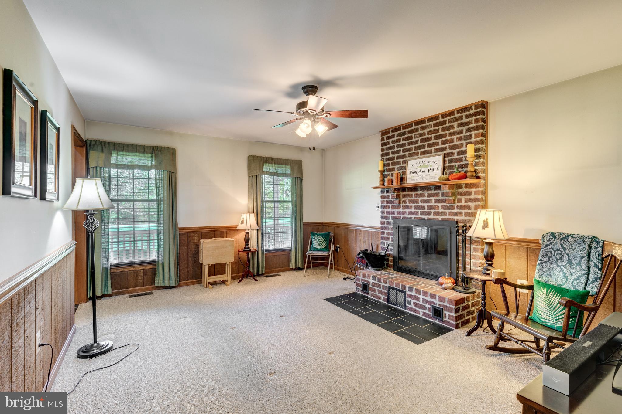 73 Dutrow Road Westminster, MD 21157 - Photo 23 of 53 Family room with brick front fireplace
