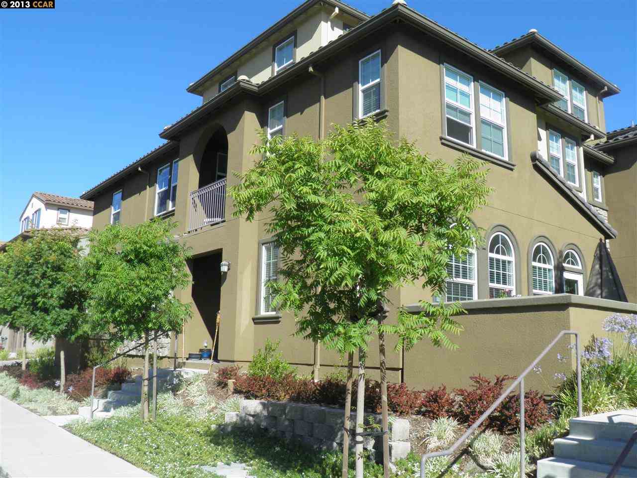 5101 Fioli Loop, Unit 35 San Ramon, CA 94582 - Photo 1 of 1 a front view of a house with plants