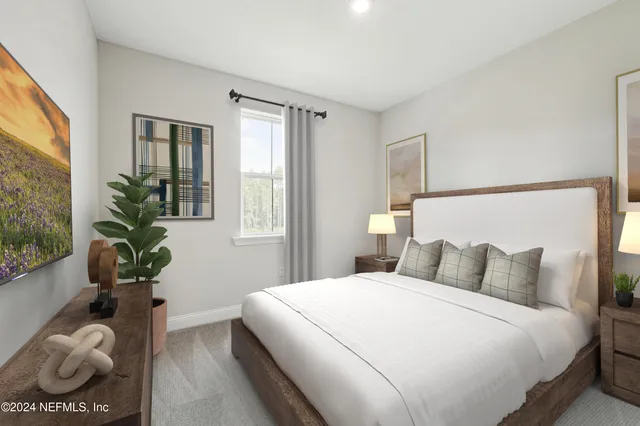 a bathroom with a double vanity sink toilet mirror and shower