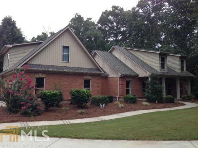 4100 Davis Academy Road Rutledge, GA 30663 - Photo 1 of 1 a front view of a house with a yard