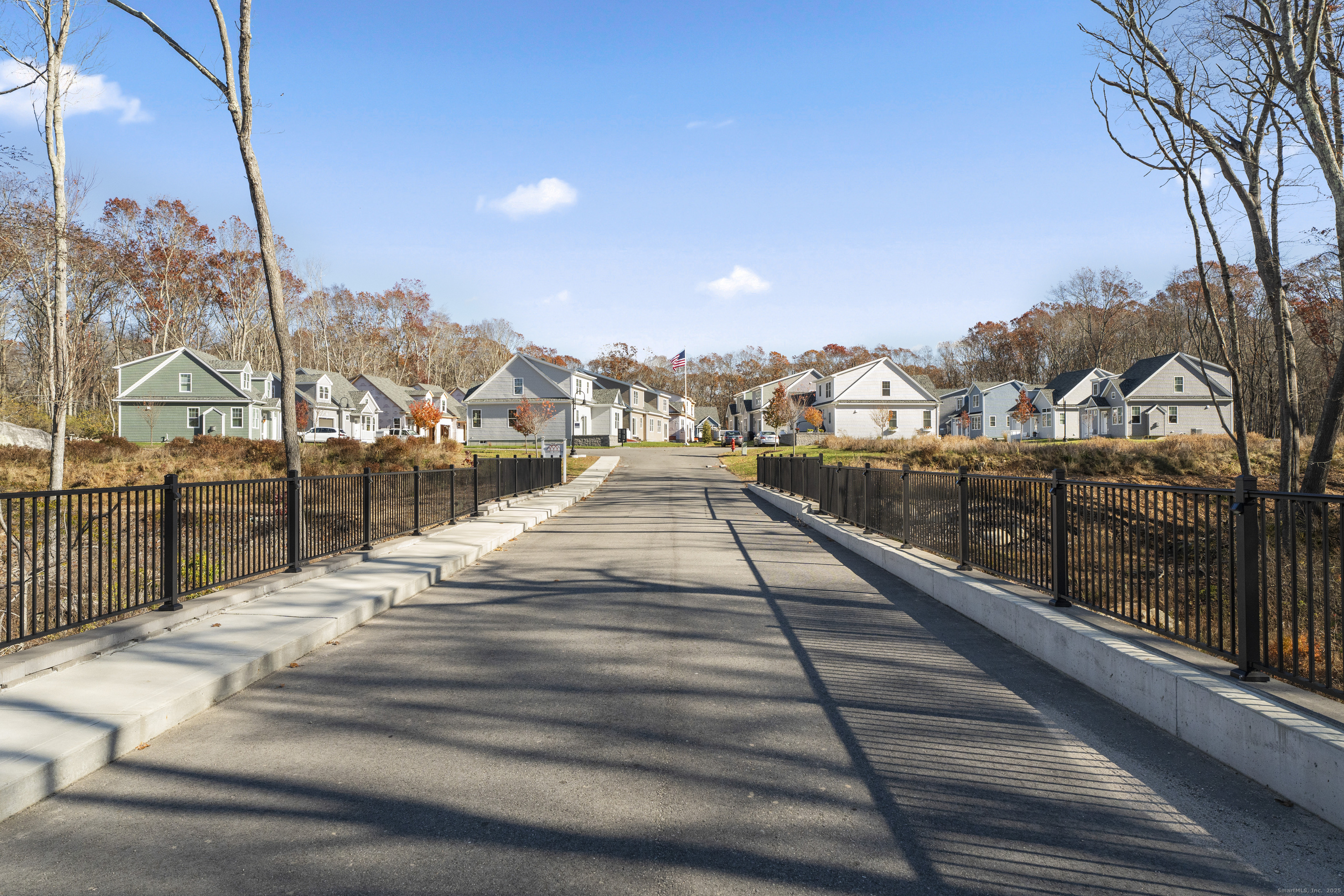 26 Ivy Hill Road, Unit 26 Waterford, CT 06385 - Photo 32 of 39 a view of a balcony with wooden floor and city view