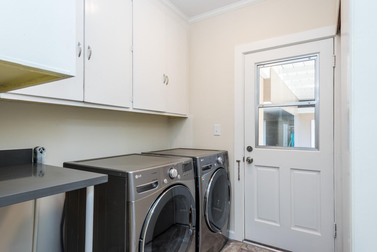739 Prospect Row San Mateo, CA 94401 - Photo 13 of 27 a utility room with dryer and washer