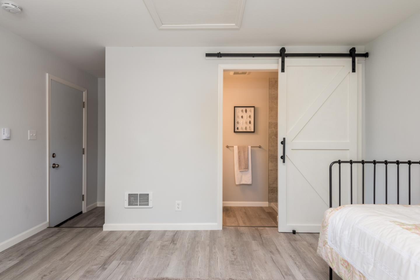 739 Prospect Row San Mateo, CA 94401 - Photo 18 of 27 a view of bedroom with a bed and wooden floor