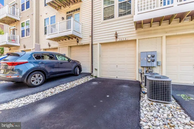 a car parked in front of a house