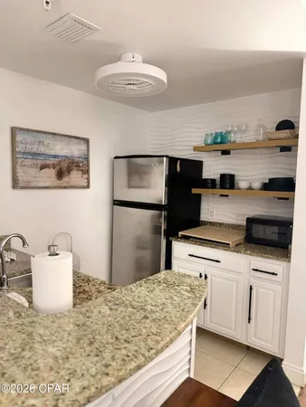 $319,900 | 114 Carillon Market Street, Unit 213, Panama City Beach, FL 32413
