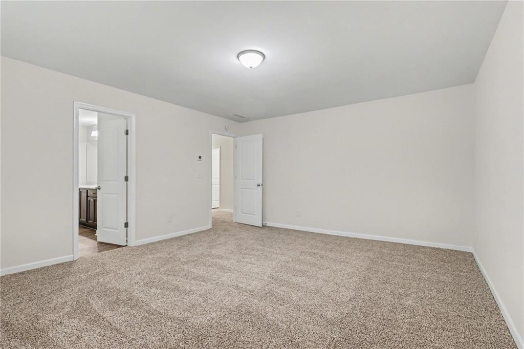4635 Bluffton Court Cumming, GA 30028 - Photo 17 of 27 a view of an empty room