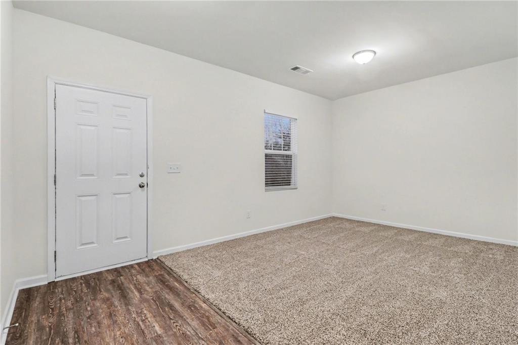 4635 Bluffton Court Cumming, GA 30028 - Photo 5 of 27 wooden floor in a room
