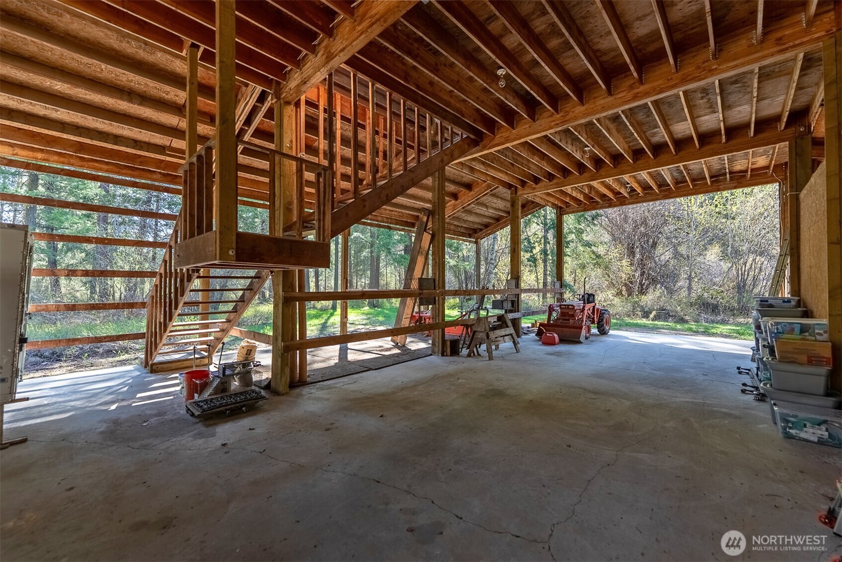 583 B Twisp River Road Twisp, WA 98856 - Photo 37 of 39 a view of a big room with wooden ceiling