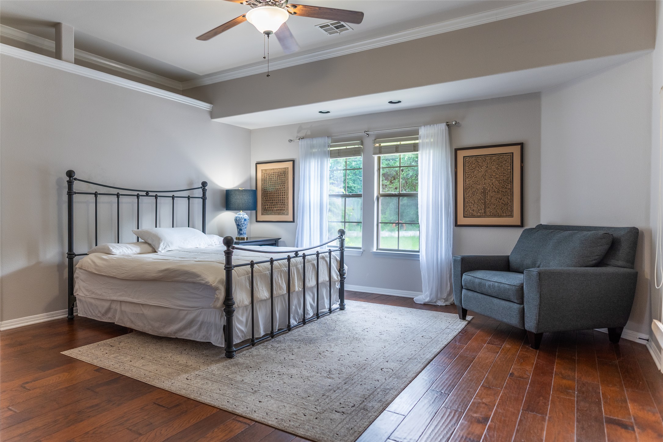 748 Nelson Ranch Road Cedar Park, TX 78613 - Photo 8 of 24 a bedroom with furniture and a large window