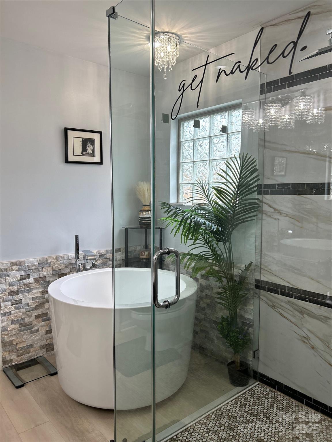 630 Springhouse Place Clover, SC 29710 - Photo 17 of 32 a white bath tub sitting in a bathroom