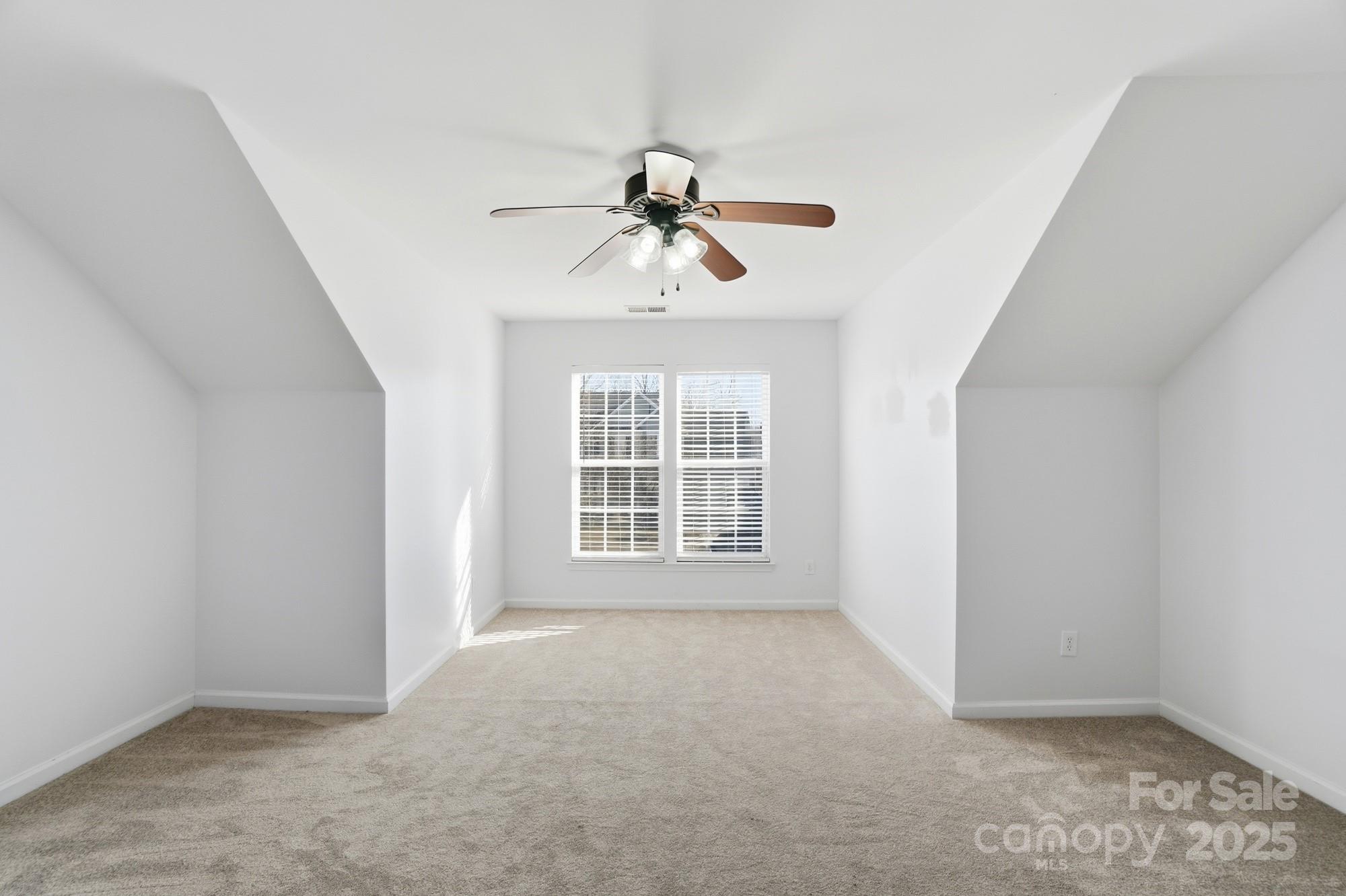 630 Springhouse Place Clover, SC 29710 - Photo 26 of 32 wooden floor in an empty room with a window