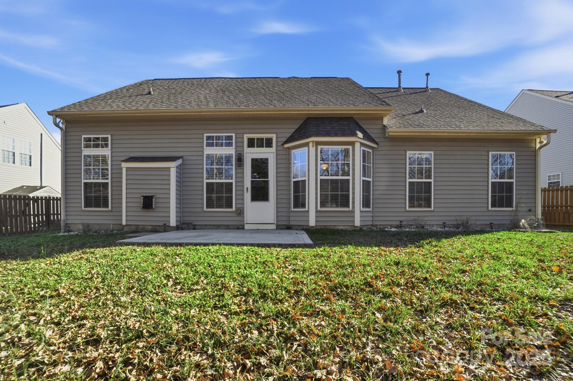 630 Springhouse Place Clover, SC 29710 - Photo 32 of 32 a front view of a house with a garden