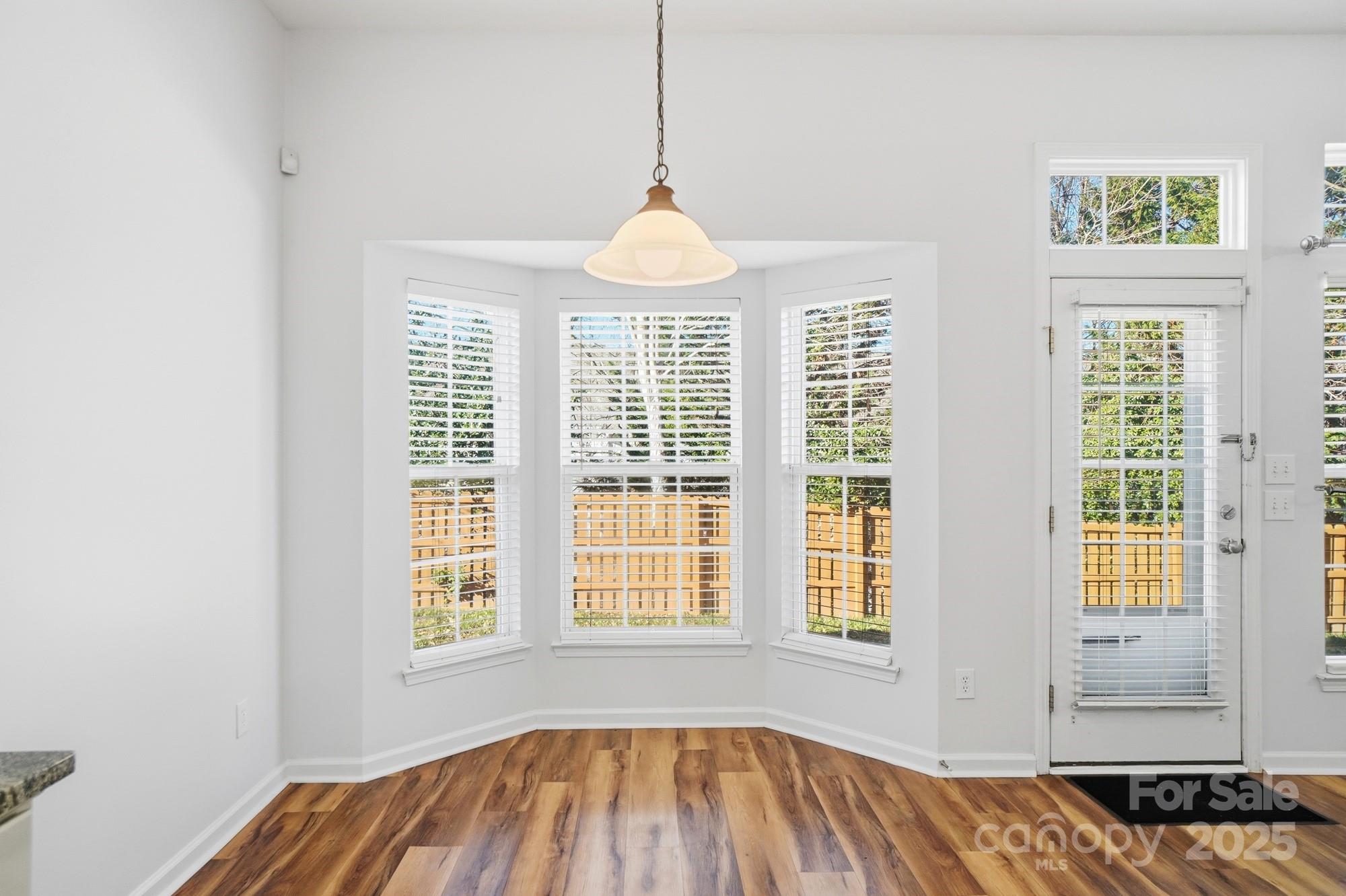 630 Springhouse Place Clover, SC 29710 - Photo 9 of 32 a bedroom with a bed and a window