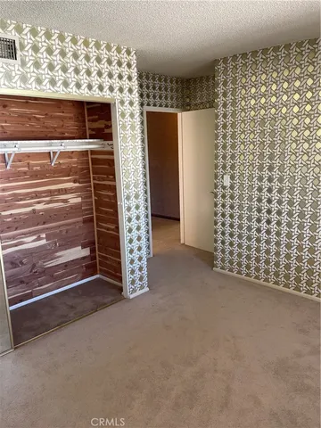 a spacious bathroom with a bathtub and next to a window