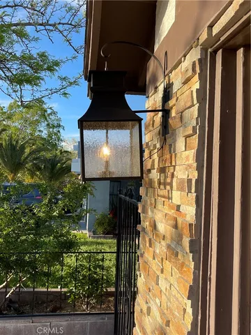 a view of backyard with wooden fence