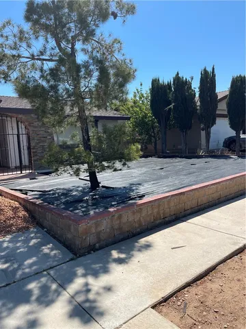 a kitchen with stainless steel appliances a sink and cabinets